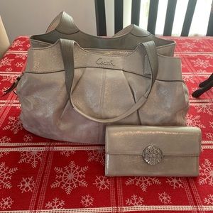 Coach gold purse and wallet.